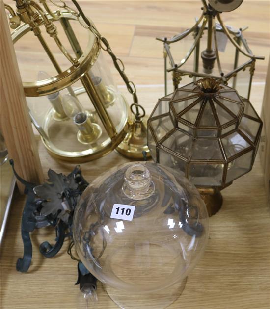 Two glass lanterns and two other lights